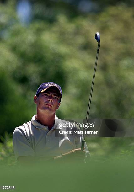 Gary Simpson of Australia, plays his tee shot to the 18th, on his way to a course record 8 under during the third round of the South Australian Ford...