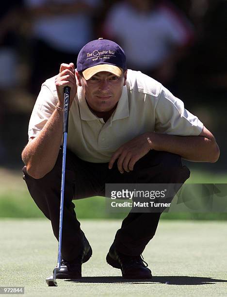 Gary Simpson of Australia, lines up a put on the 17th green, on his way to a course record 8 under during the third round of the South Australian...
