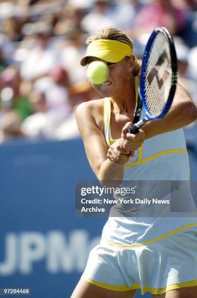 Maria Sharapova of Russia hits a backhand shot to Julia Schruff of Germany during third round play in the U.S. Open at Arthur Ashe Stadium in...