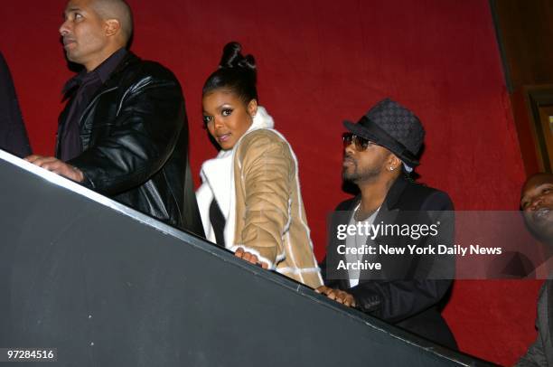Janet Jackson and beau Jermaine Dupri ride an escalator at the Ziegfeld Theatre on W. 54th St., where they attended the world premiere of the...