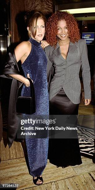Janet Jackson is accompanied by her former sister-in-law, Lisa Marie Presley, at a party in the Chrysler Building for the release of Jackson's new...