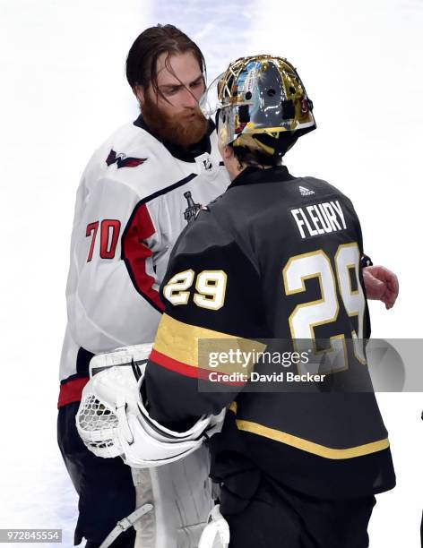 Braden Holtby of the Washington Capitals and Marc-Andre Fleury of the Vegas Golden Knights shake hands after Game Five of the 2018 NHL Stanley Cup...