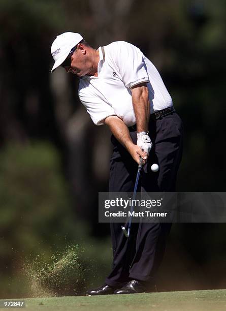 Peter Lonard of Australia, plays his second shot to the 17th green during the third round of the South Australian Ford Open Championships being held...