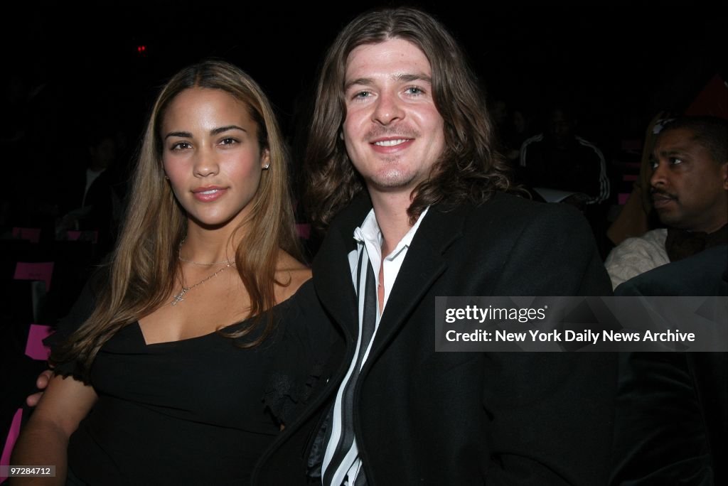 Singer Robin Thicke and his girlfriend, Paula Patton, are on