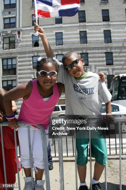 Nazaret Mencia Brian Pena come out to celebrate the Dominican Day Parade on the Grand Concourse in the Bronx .