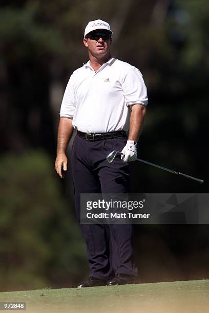 Peter Lonard of Australia, watches his second shot to the 17th green during the third round of the South Australian Ford Open Championships being...