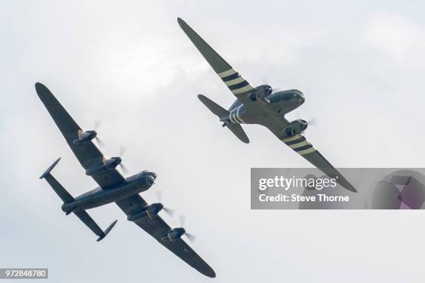 An Avro Lancaster and Douglas Dakota perform a fly past on June 10, 2018 in Wolverhampton, England. 2018 marks the Royal Air Force's centenary, and...