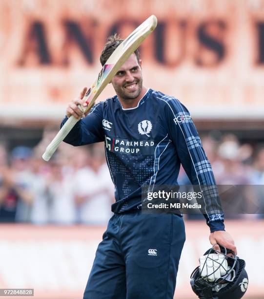 Scotland's Calum MacLeod leaves the field at the end of the first innings of the one-off ODI at the Grange Cricket Club on June 10, 2018 in...