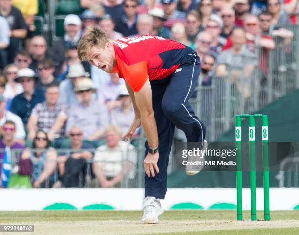 David Willey bowls in the first innings of the one-off ODI at the Grange Cricket Club on June 10, 2018 in Edinburgh, Scotland.