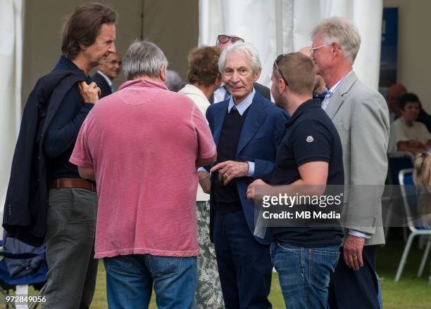 Rolling Stone drummer, Charlie Watts, chats to officials during the second innings of the one-off ODI at the Grange Cricket Club on June 10, 2018 in...