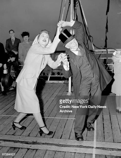 Spirited Performer Does His Stuff, 77-year-old Joseph Carey of Aberystwyth, Wales, arrives here on the Nieuw Amsterdam, en route to Canada to visit...