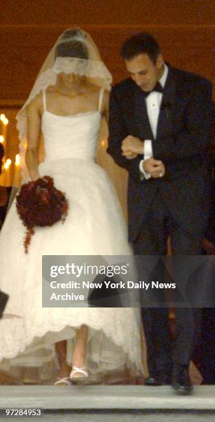 Today" show host Matt Lauer and model Annette Roque leave Bridgehampton Presbyterian Chuch on Long Island after their wedding.