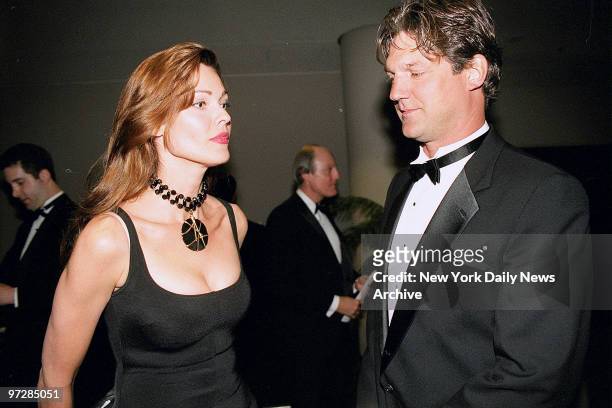 Sports Emmy Awards at Marriott Marquis Carol Alt is all dolled up and is admired by her husband Ron Greschner ?