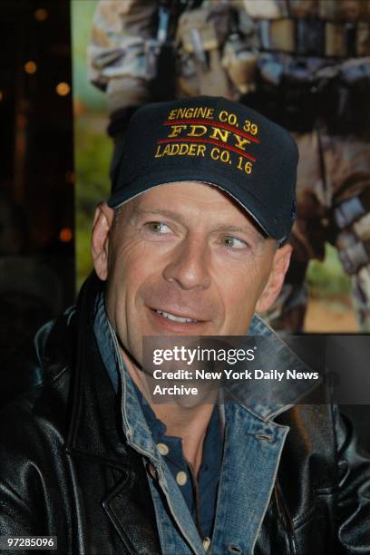 Bruce Willis sports an FDNY cap at Planet Hollywood where he was on hand to present the restaurant with memorabilia from his latest flick, "Tears of...