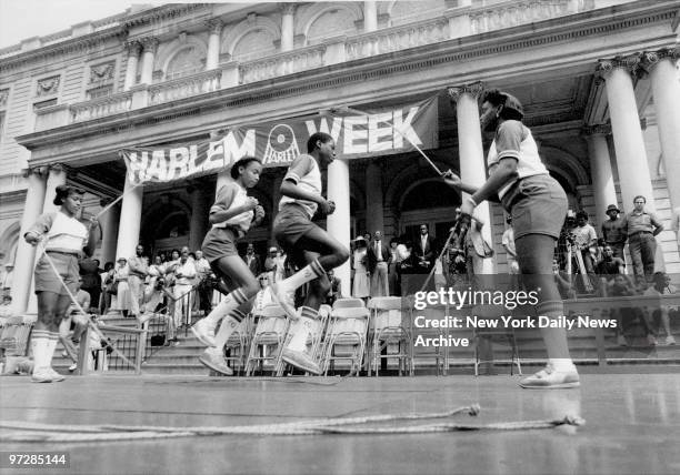 Near the steps of City Hall, McDonald's double-dutch jump-rope champs demonstrate some first-class footwork as the 10th annual Harlem Week...