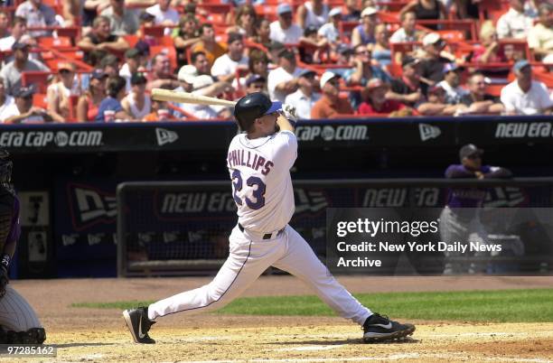 The New York Mets' Jason Phillips belts a two-run homer in the third against the Colorado Rockies at Shea Stadium. The Mets went on to an 8-0 win...