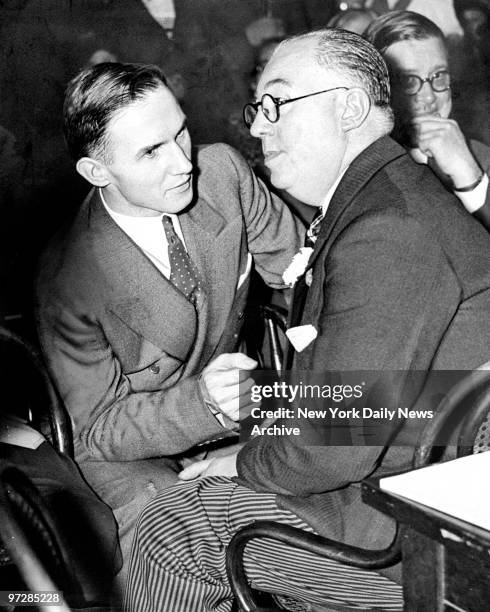 Bruno Richard Hauptmann , alleged kidnapper and murderer of Charles Augustus Lindbergh Jr., and chief defense counsel, Edward J. Reilly, in...