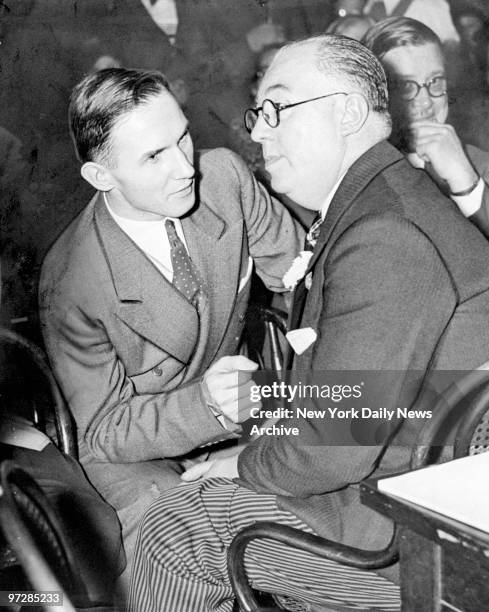 Bruno Richard Hauptmann , alleged kidnapper and murderer of Charles Augustus Lindbergh Jr., and chief defense counsel, Edward J. Reilly, in...