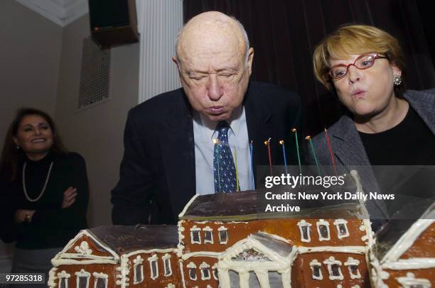 Former Mayor Ed Koch blows out the candles during a celebration of his 80th birthday at the Museum of the City of New York, Fifth Ave. At 104th St....