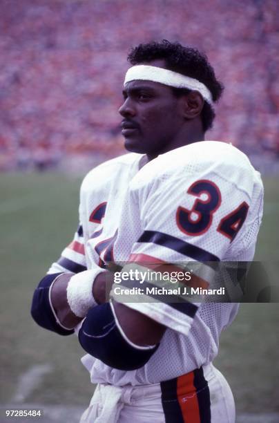 Running back Walter Payton of the Chicago Bears looks on from the side line area during their NFL game against the Tampa Bay Buccaneers at Tampa...