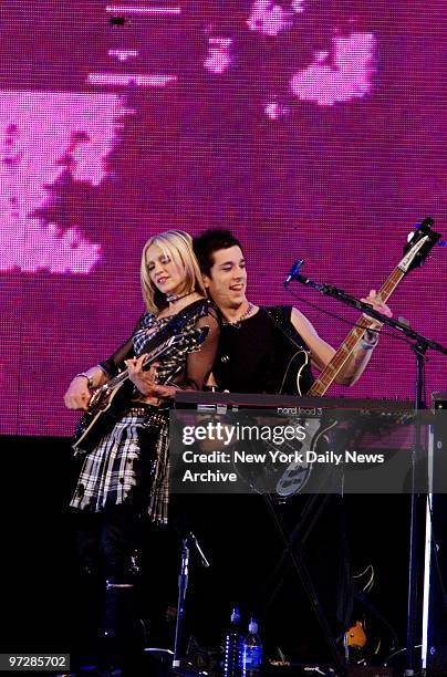 Madonna performs at the kickoff of the U.S. Leg of her "Drowned World" tour at the First Union Center in Philadelphia.