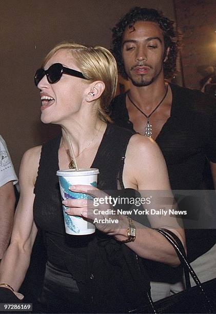 Madonna and her boyfriend Carlos Leon arrive at the Tribeca Screening Room for a screening of the movie "Kids."