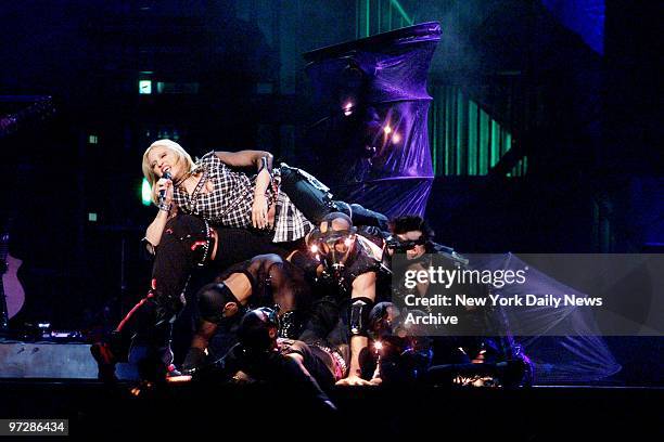 Madonna performs at the kickoff of the U.S. Leg of her "Drowned World" concert tour at the First Union Center in Philadelphia.