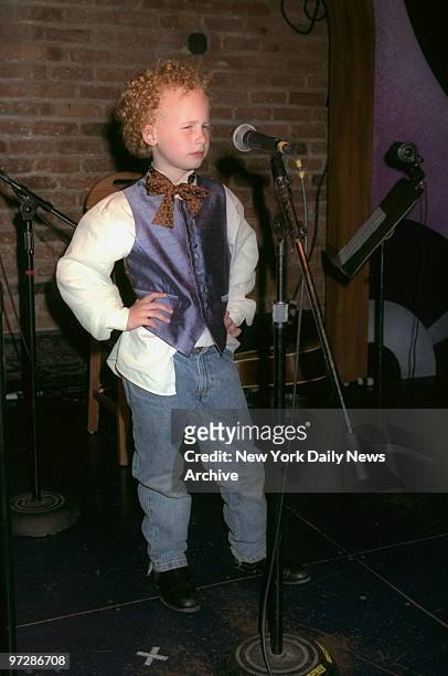 Six-year-old James Garfunkel faces microphone with assurance at the Village Gate. James was on hand to help his pop, Art Garfunkel, launch two new...