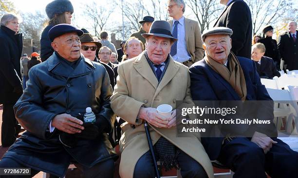 Former New York City Mayor David Dinkins meets former Governor Hugh Carey and former New York City Mayor Ed Koch during a dedication ceremony...