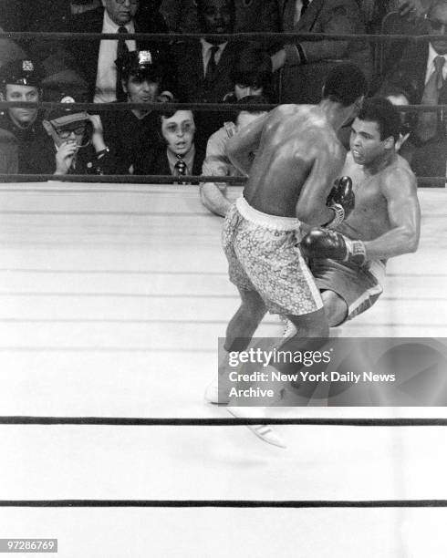 Smokin' Joe Frazier fist knocking out Muhammad Ali in the 15th round at Madison Square Garden.