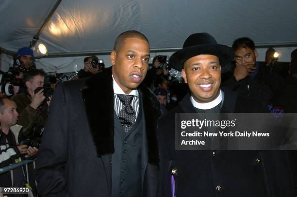 Jay-Z and Joseph Simmons of Run DMC arrive at the Ziegfeld Theatre on W. 54th St. For the world premiere of the documentary film "Fade to Black." The...