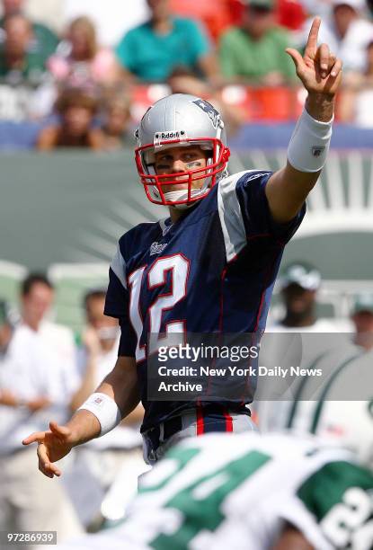 New England Patriots' quarterback Tom Brady calls a play during the first half of a game against the New York Jets at Giants Stadium. The Patriots...