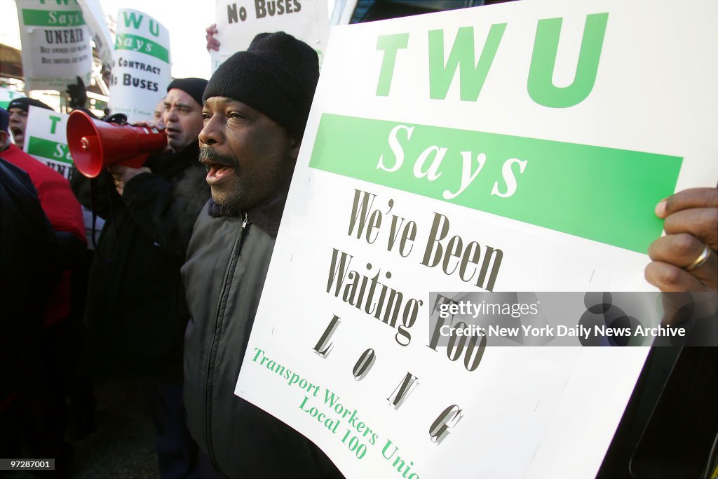 Bus drivers with the Transport Workers Union Local 100 gathe