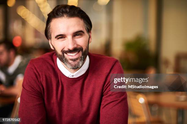 portrait of a handsome smiling man - 40 year old male models stock pictures, royalty-free photos & images