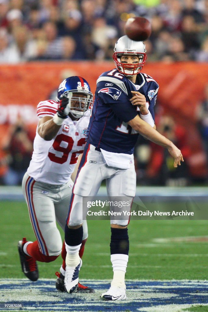 New England Patriots' quarterback Tom Brady passes the ball