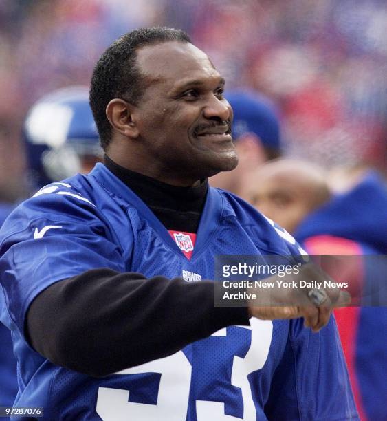 Former New York Giants' star Harry Carson rejoices as the Giants crush the Minnesota Vikings, 41-0, in the NFC Championship Game at Giants Stadium.