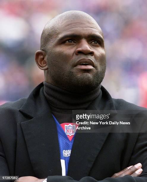 Former New York Giants' star Lawrence Taylor looks on as the Giants crushed the Minnesota Vikings, 41-0, in the NFC Championship Game at Giants...