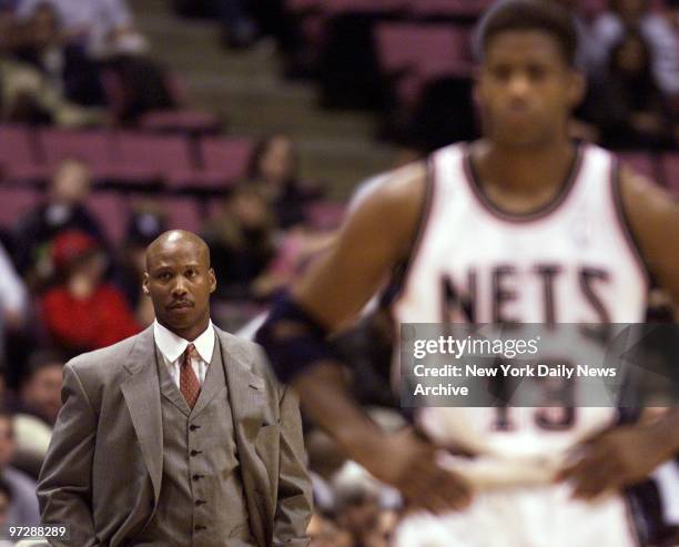 New Jersey Nets' head coach Byron Scott watches as a foul shot is taken as his team faces off against the Cleveland Caveliers at Continental Airlines...