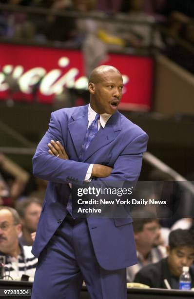 New Jersey Nets' head coach Byron Scott yells instructions to his team during game against the Cleveland Cavaliers at the Continental Airlines Arena....