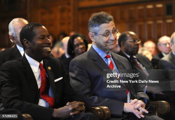 Senate Majority Leader Malcolm Smith and Assembly Speaker Sheldon Silver listen as Chief Judge Jonathan Lippman is speaking after his swearing in...