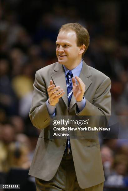 New Jersey Nets' head coach Lawrence Frank has reason to smile as his team wins its 14th straight game, 13 under Frank, by beating the Toronto...
