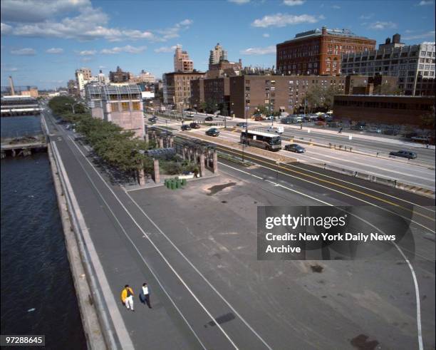 The renovated West Side Highway with a new bike path, road and median.