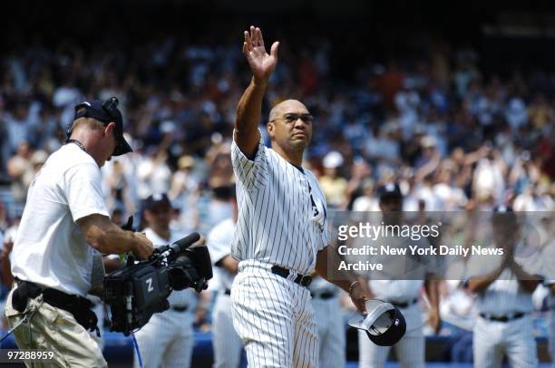 Former New York Yankees' outfielder and Hall of Famer Reggie Jackson, who's now the Yanks' senior advisor, waves to the crowd during 58th annual...