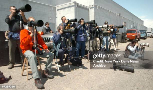 Cameras are set up as media covers the funeral of Rachel Scott, one of the victims at Columbine High School in Littleton, Colo., where two teenagers...