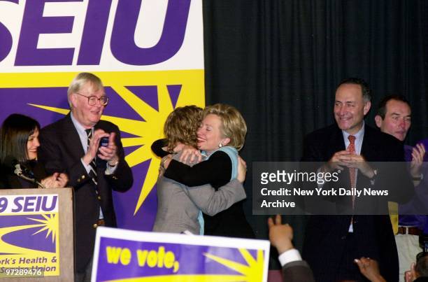 Senatorial hopeful Hillary Rodham Clinton gives her daughter, Chelsea, a big hug onstage after addressing members of Local 1199 at the Health and...