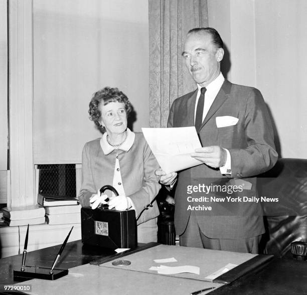 Former owner Marie H. Tilyou and new owner Fred Trump after sale of Steeplechase Park. The boundaries of Steeplechae Park are the Boardwalkt West...