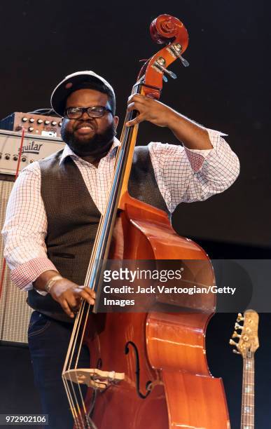American Jazz musician Jahmal Nichols performs on upright acoustic bass with the Gregory Porter Septet at a concert in the Blue Note Jazz Festival at...