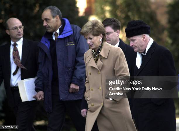New Jersey Gov. Christie Whitman is flanked by State Police Superintendent Carson Dunbar and Newark Archbishop Theodore McCarrick on arrival at Seton...