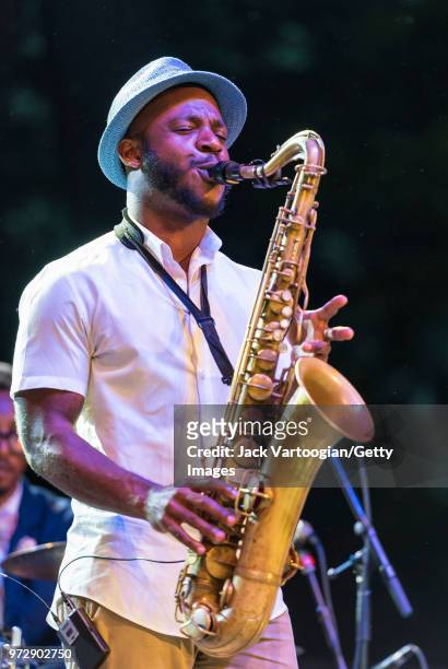 American jazz musician Tyvon Pennicott performs on tenor saxophone with the Gregory Porter Septet at a concert in the Blue Note Jazz Festival at...