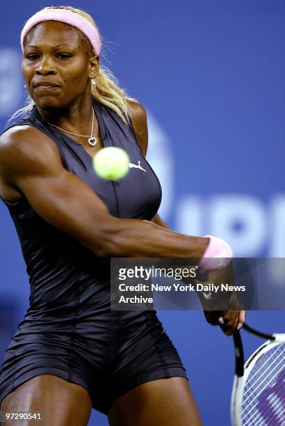 Serena Williams starts her swing on a return to Venus Williams in the Women's Final of the U.S. Open at Flushing Meadows-Corona Park in Queens....